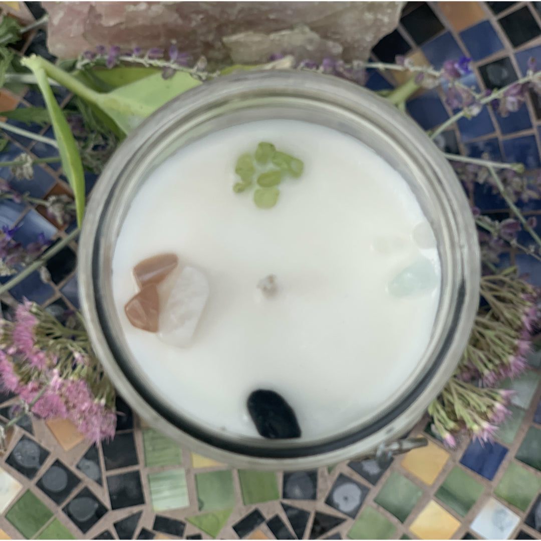 Our Archangel Saint Uriel is crowned with Aquamarine, Emerald, Moonstone and Peridot.