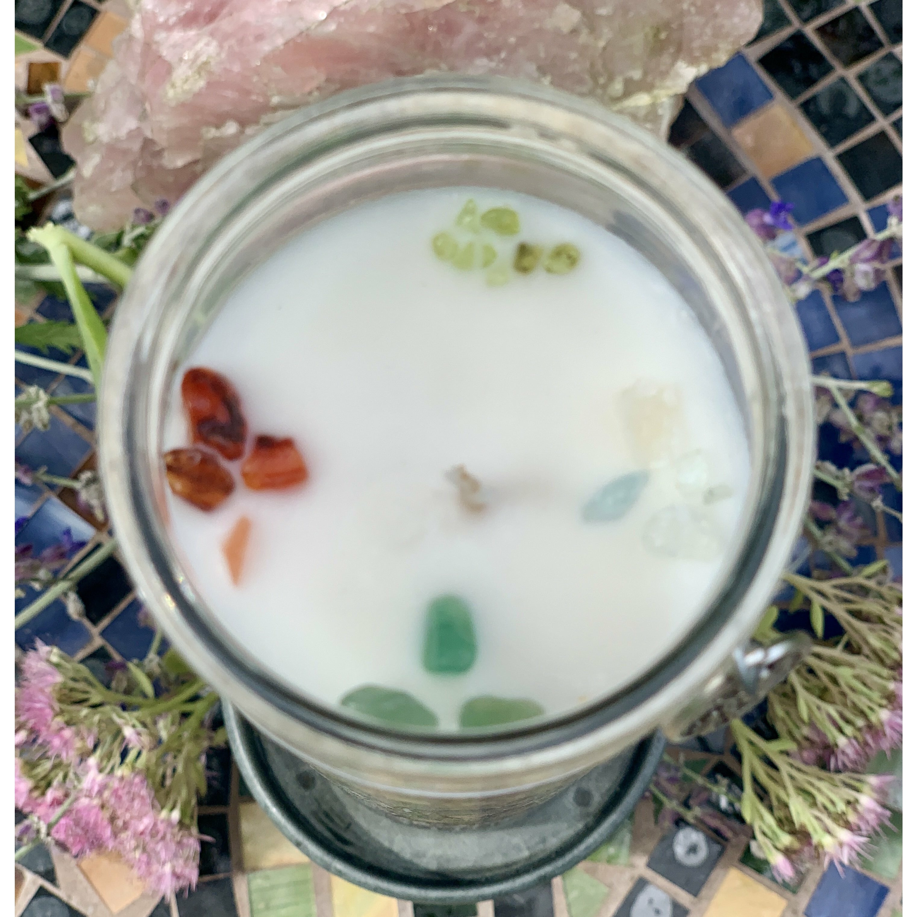 Our Archangel Saint Raphael candle is crowned with Aquamarine, Aventurine, Citrine and Peridot.